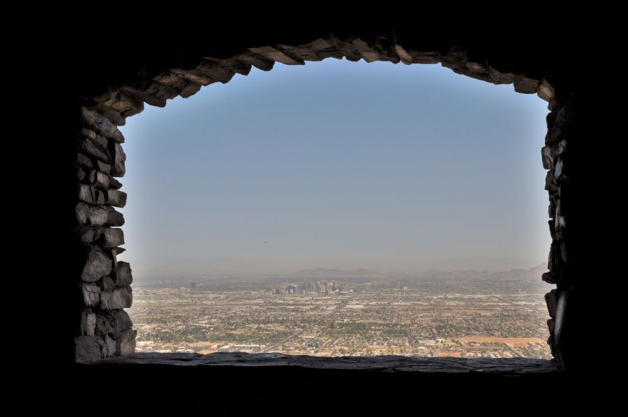An image taken from the top of South Mountain while displays all of the metro area through a window. 
