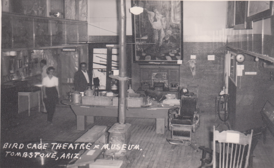 An old black and white image of the interior of the Bird Cage Theatre.