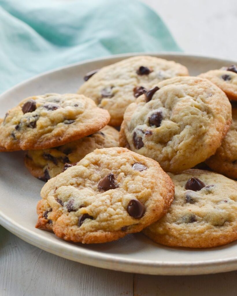 a plate of chocolate chip cookies